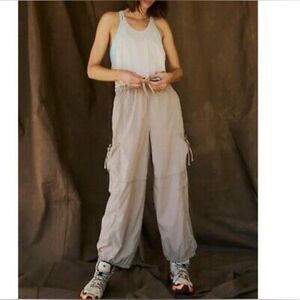 Free People Movement Back Packer Jumpsuit Muted Beige Size Med. NWT